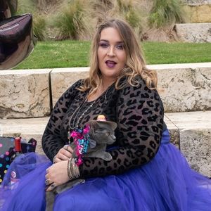 Cat Mama in this Torrid Sheer leopard crop top